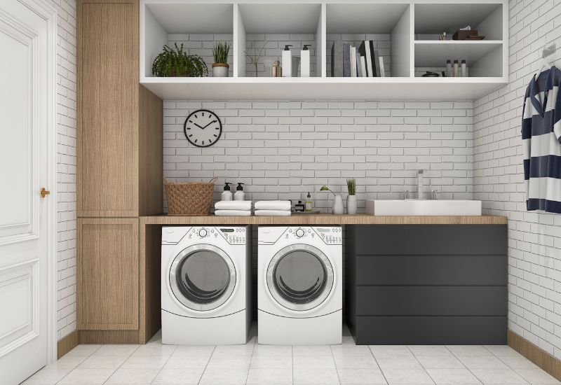 Custom laundry cabinetry with bench and storage